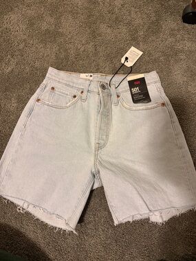 Levi's Light Blue Raw Hem Denim Shorts